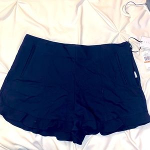 High-waisted peplum shorts
